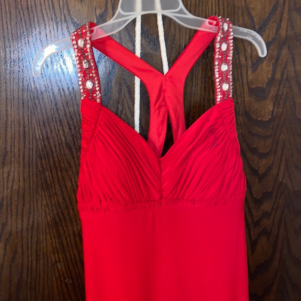 Long red prom dress gems on front and back open back from ig note evenings